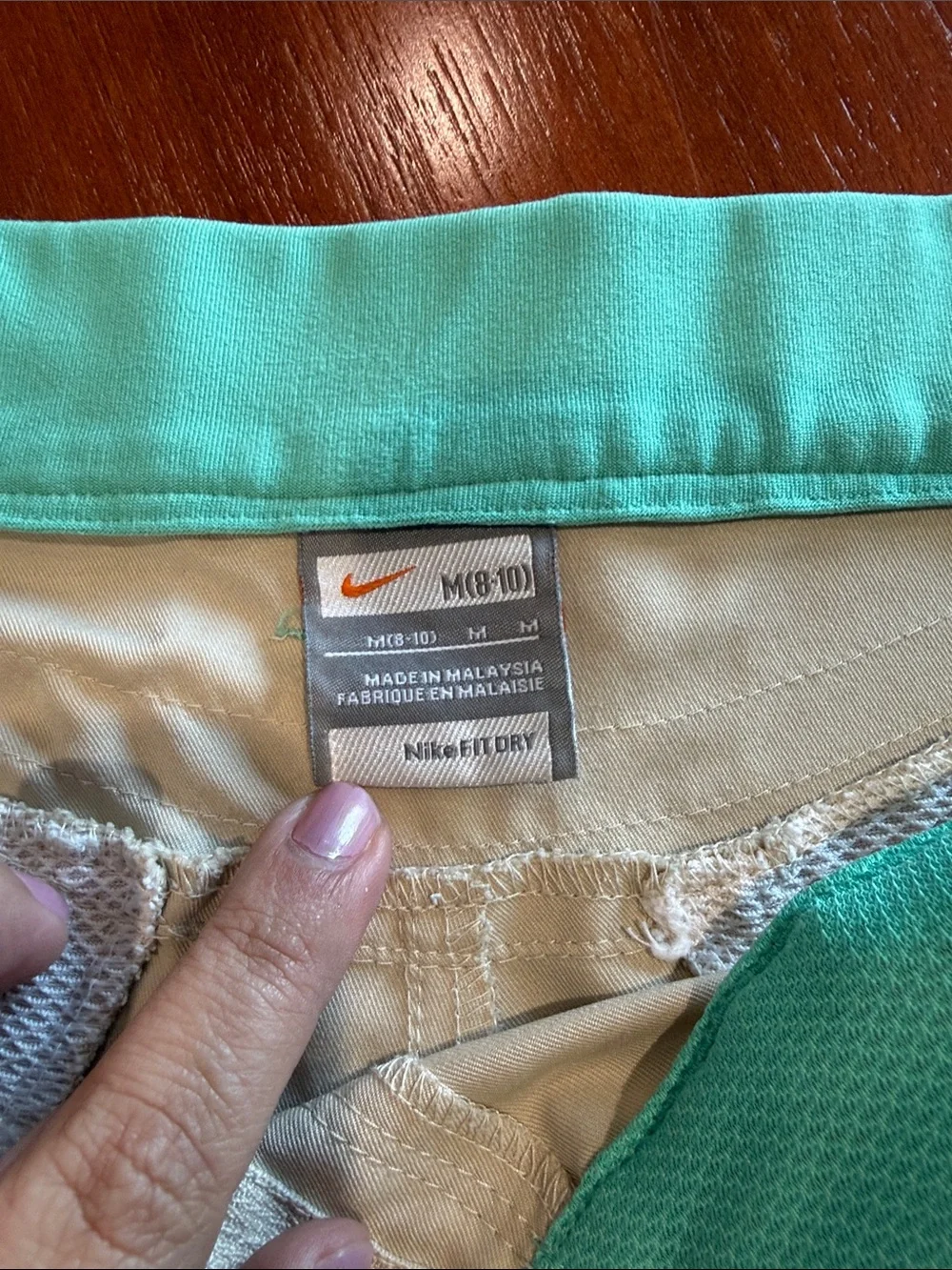 Nike Women's Light Khaki Performance Shorts with Teal Waistband